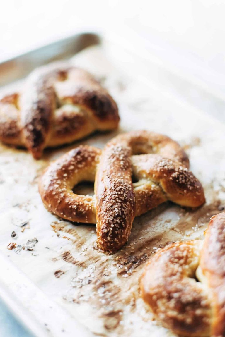 Soft pretzels on a sheet pan.