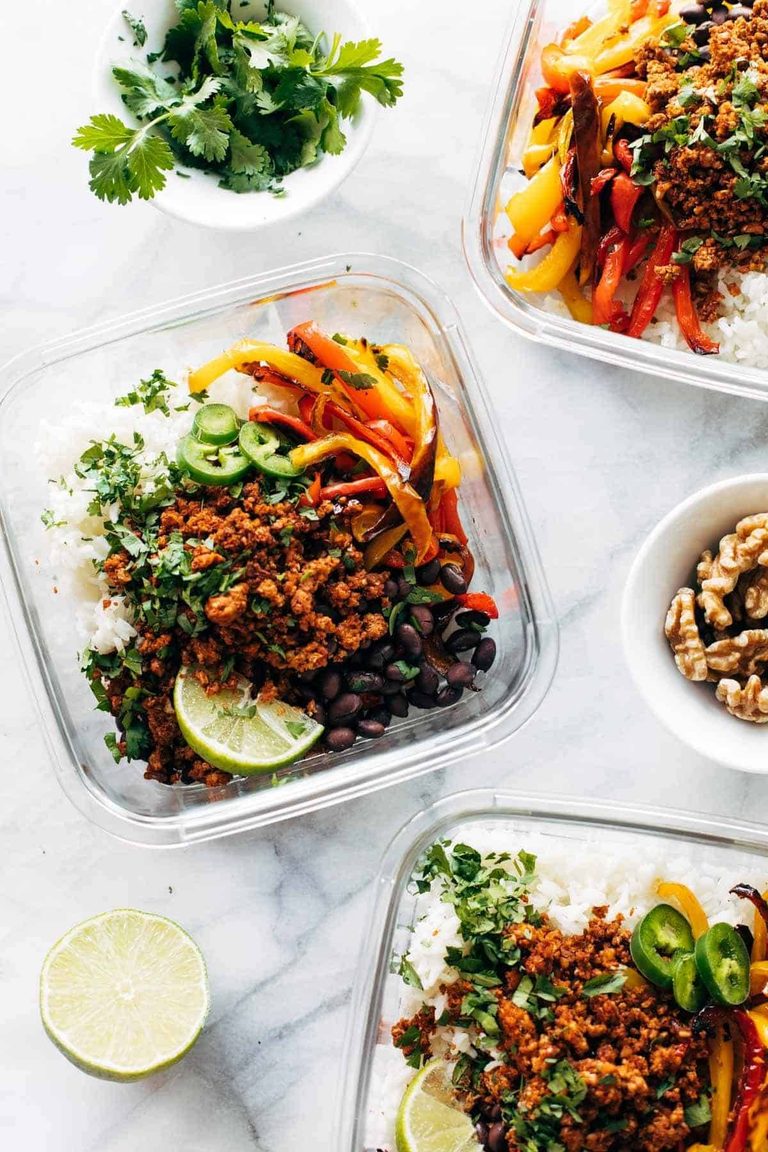 Vegan burrito bowls in containers.