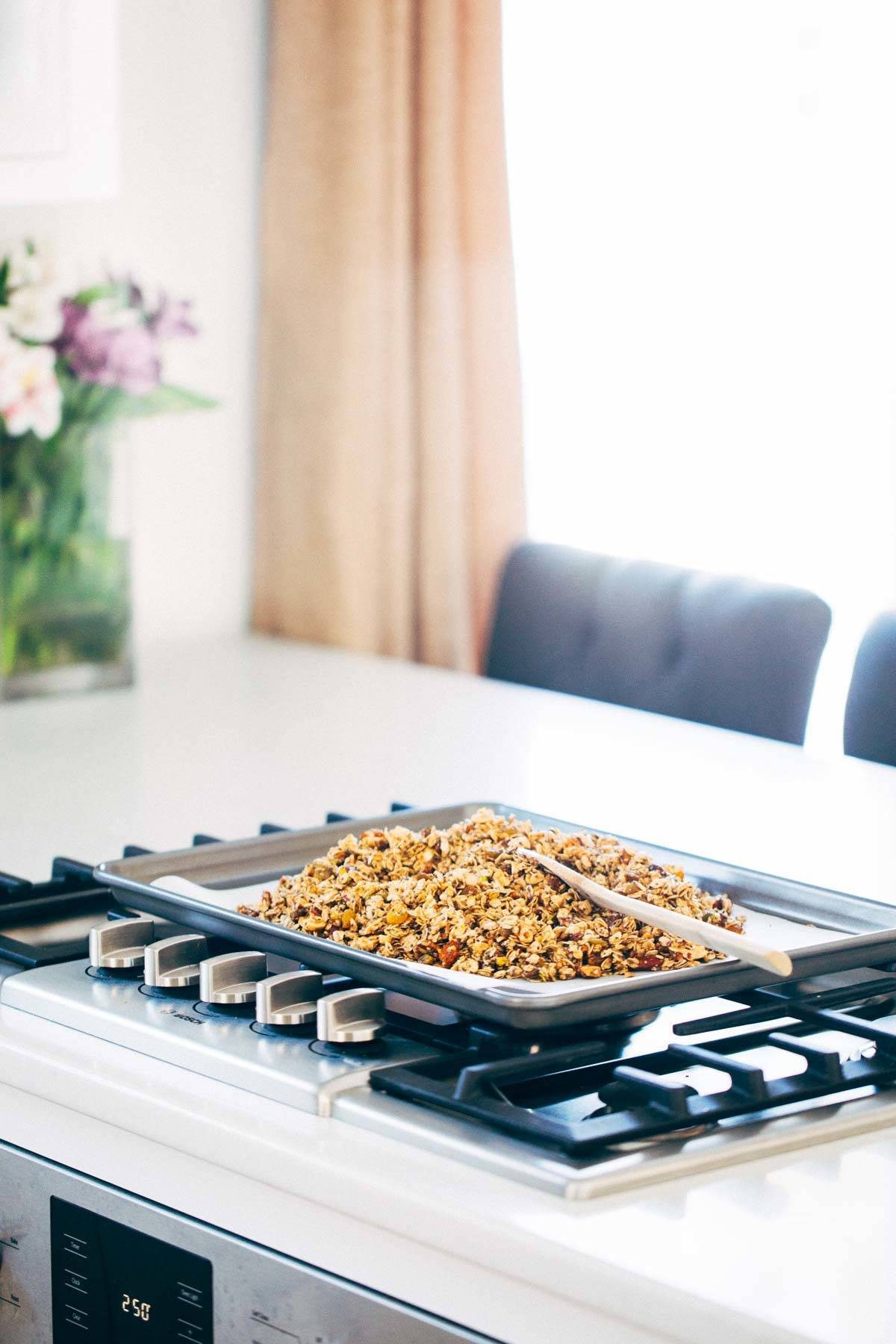 Granola on a pan over the stove.